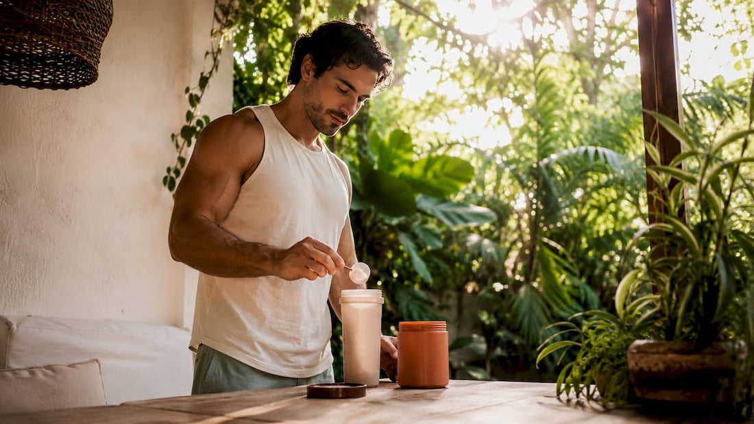 Bodybuilder preparing L-arginine supplement drink